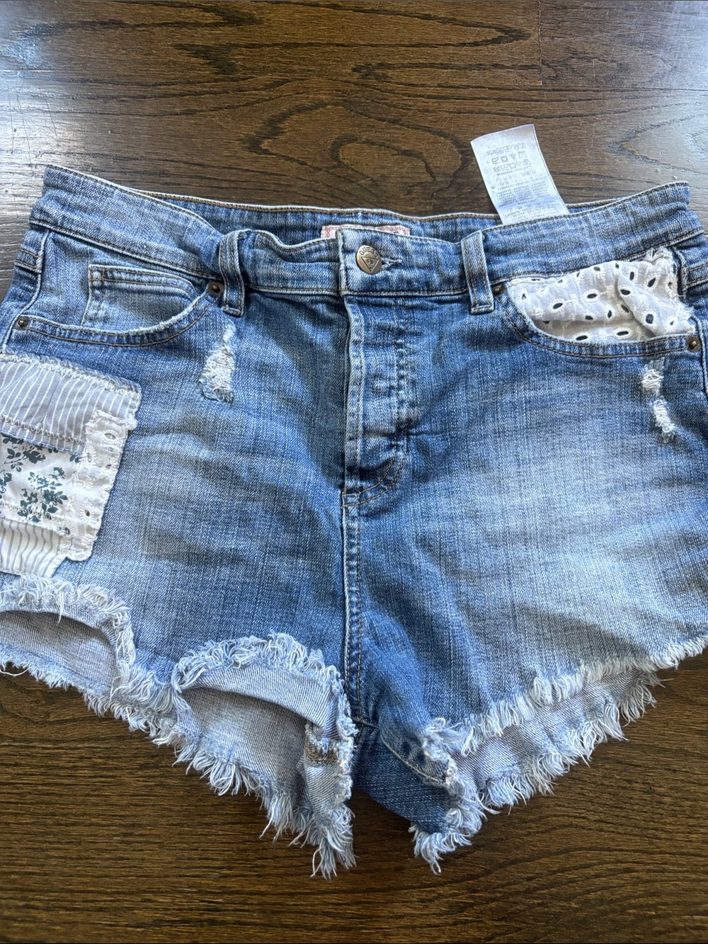 Guess Light Blue Distressed Denim Shorts with Patch Accents